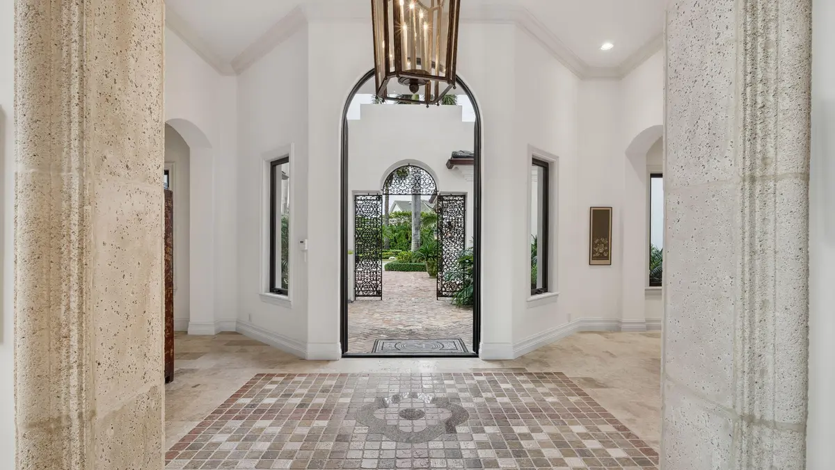 Entrance Foyer into home at 1014 Grand Court, Highland Beach
