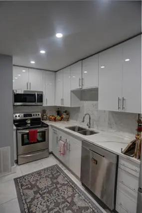 Kitchen with quartz and backsplash 188 L at 188 Lake Evelyn Drive, West Palm Beach