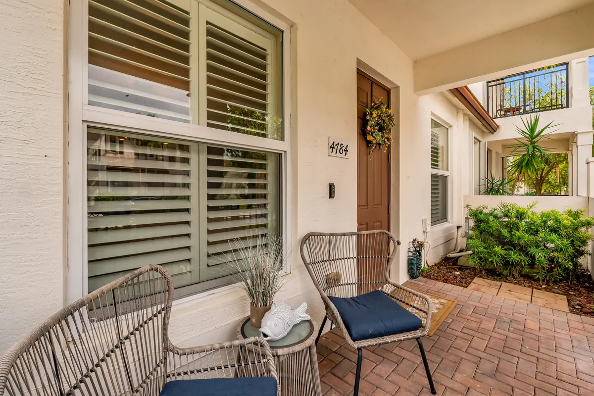 Ground level entry PORCH at 4784 Acadian Trail, Coconut Creek