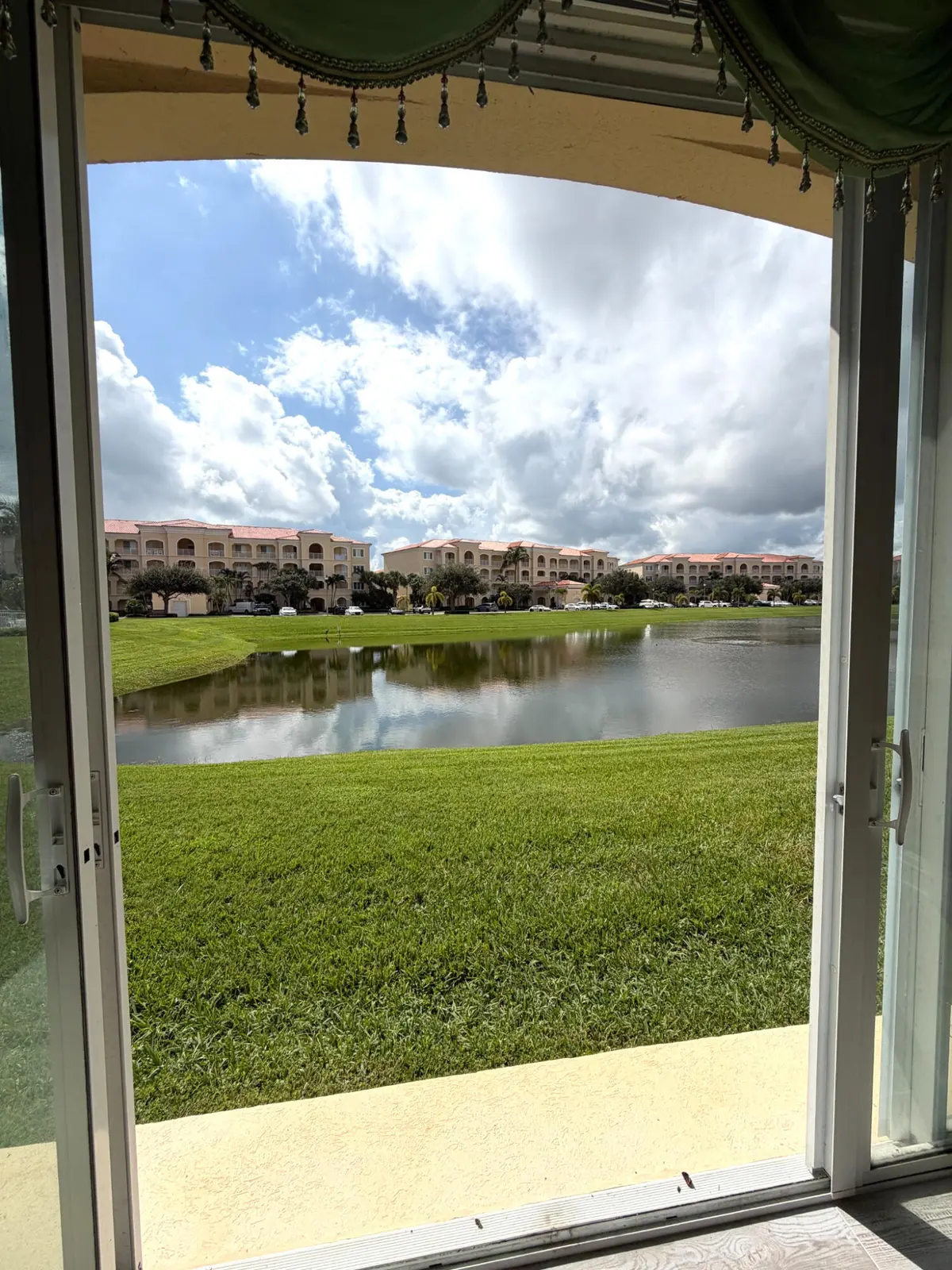 MLS_Brightened_View_Photo_1 at 2 HARBOUR ISLE Drive 101, Fort Pierce