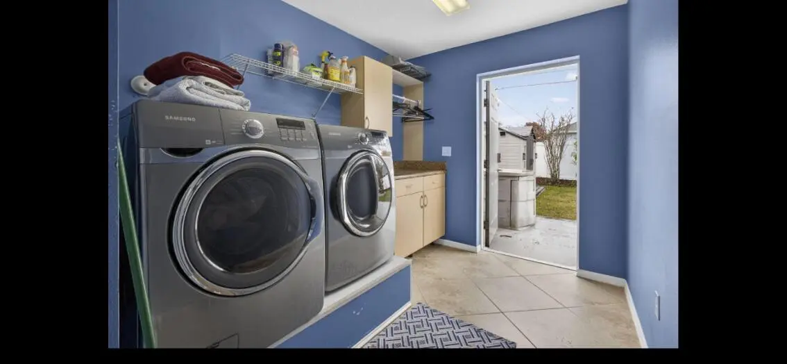 Laundry room at 1618 SW nervia Avenue, Port St. Lucie