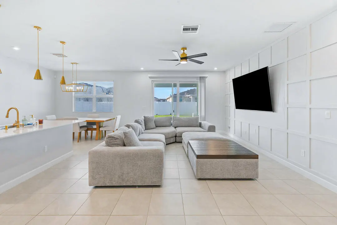 Living Room with Feature Wall at 14132 SW ENZI Way, Port St. Lucie