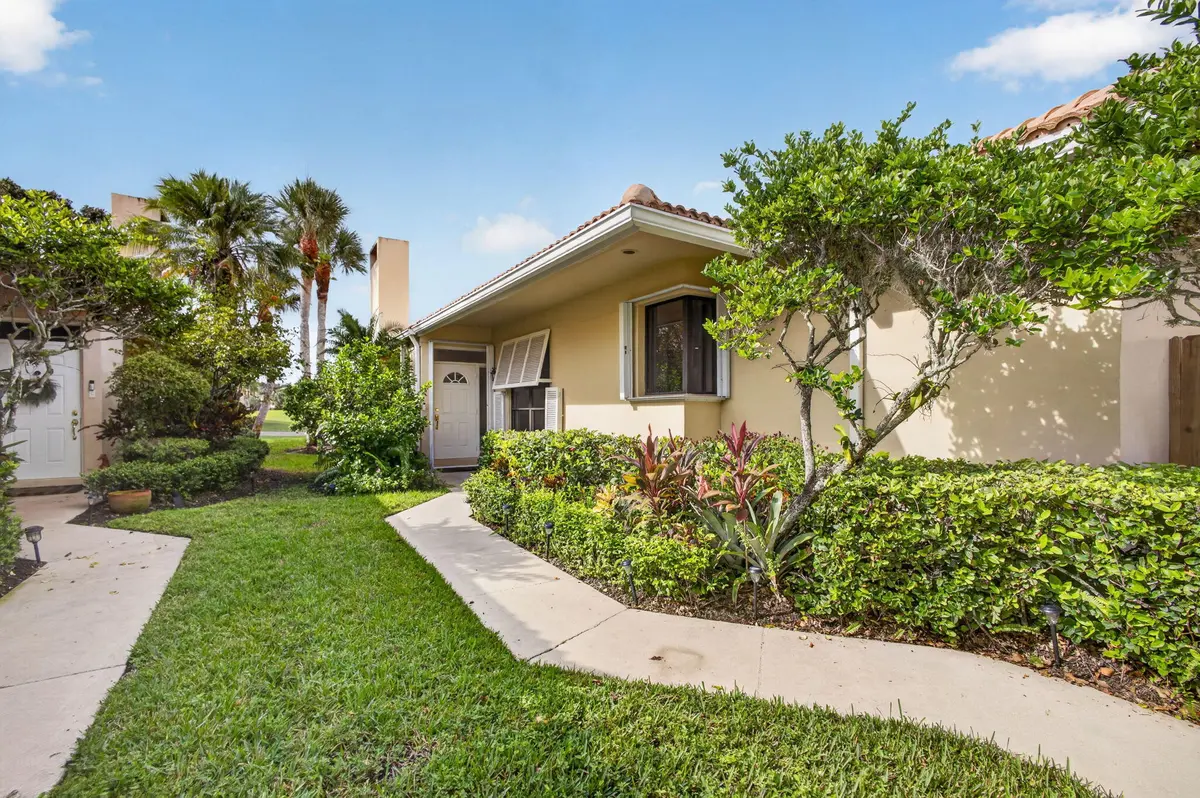 02 - Front entry walkway at 287 OLD MEADOW Way, Palm Beach Gardens