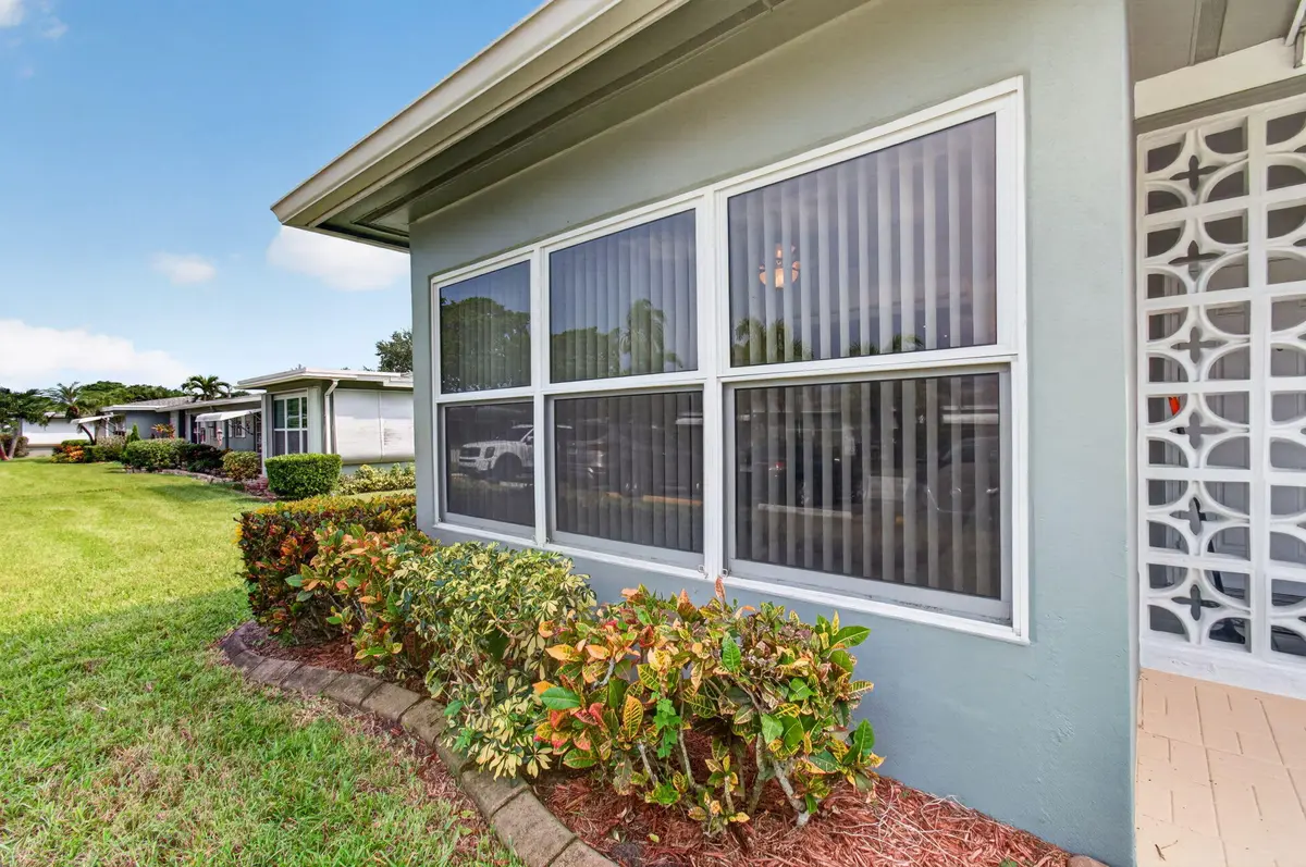 Impact windows throughout at 702 South Drive A, Delray Beach