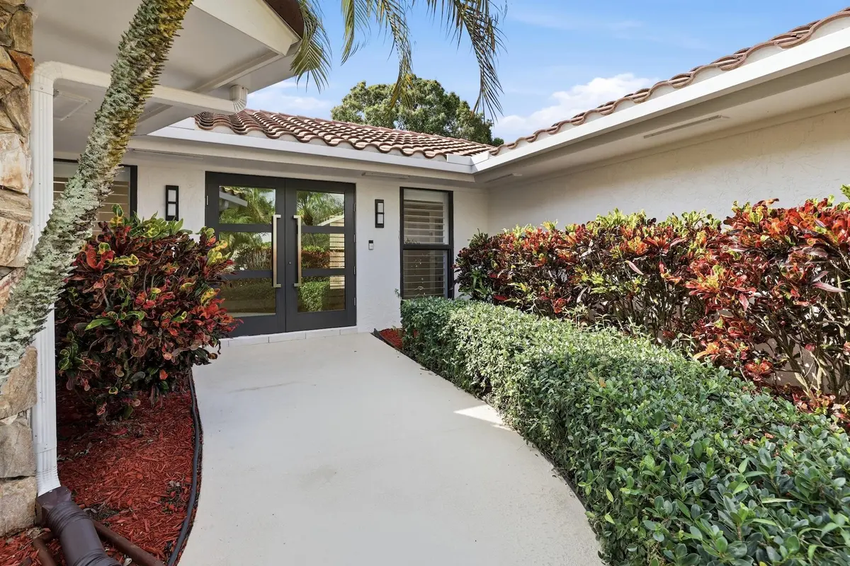 Front Entry at 1013 SHADY LAKES Circle, Palm Beach Gardens