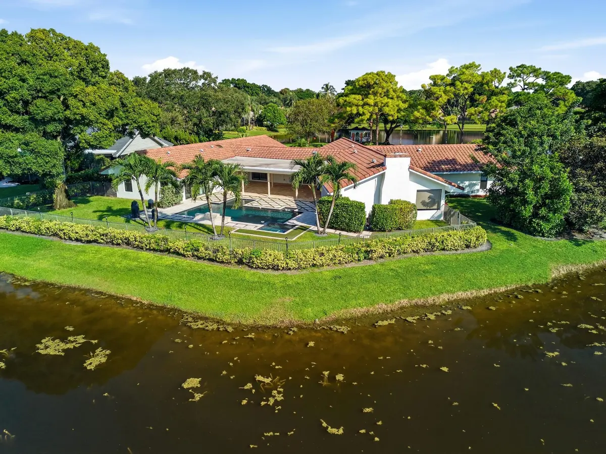 Aerial Rear Lake at 1013 SHADY LAKES Circle, Palm Beach Gardens