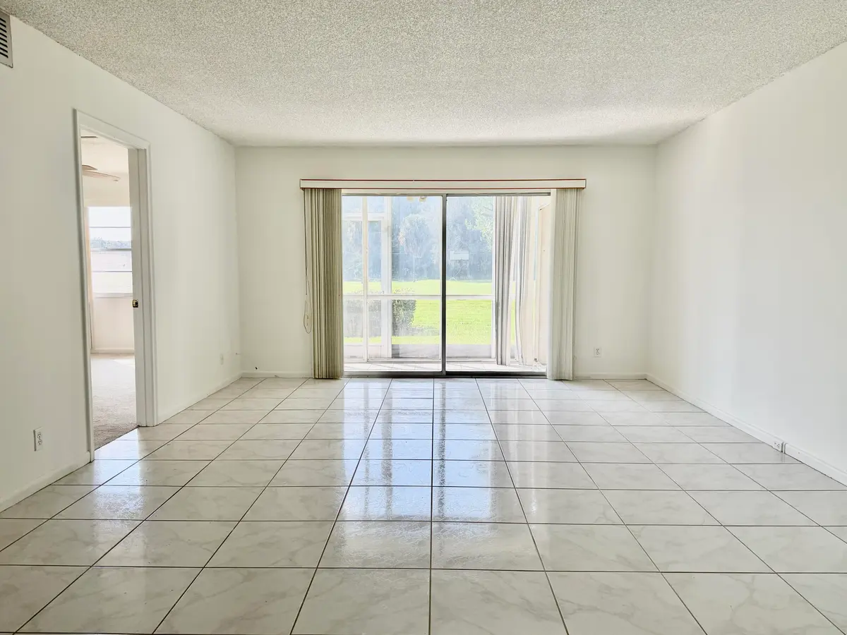 Living room at 12500 SW 6TH Street 110N, Pembroke Pines