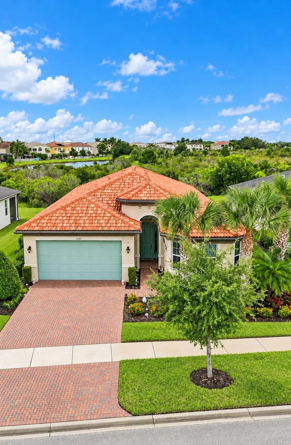 Bright Mediterranean Home Listing at 11331 SW LAKE PARK Drive, Port St. Lucie