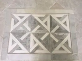 Entrance marble inlay at 149 MOCCASIN Trail, Jupiter