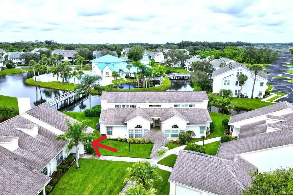 Arrow points to Front Entry of Condo at 1867 AYNSLEY Way 2, Vero Beach