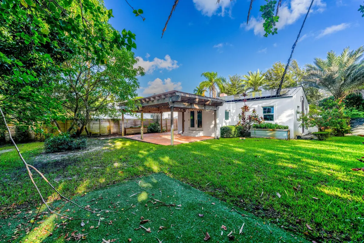 Large side and back yard at 36 NW 101ST Street, Miami Shores