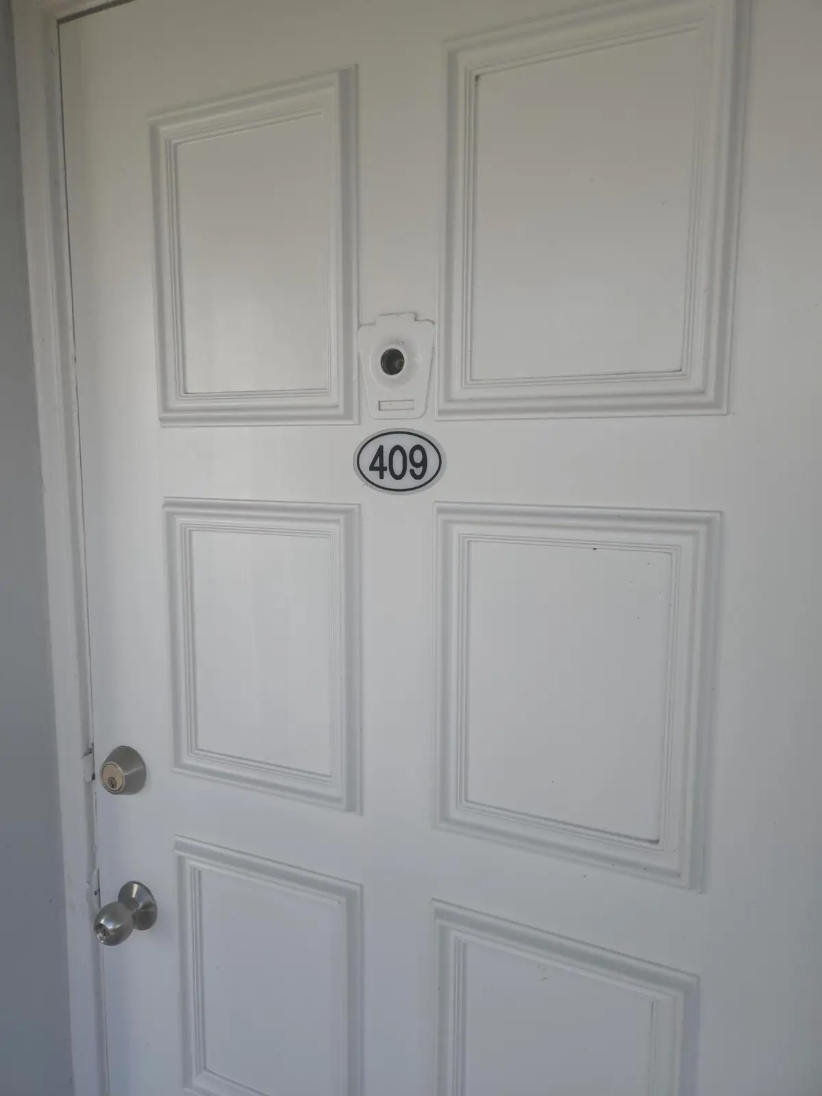 Front door at 3150 N Course Lane 409, Pompano Beach