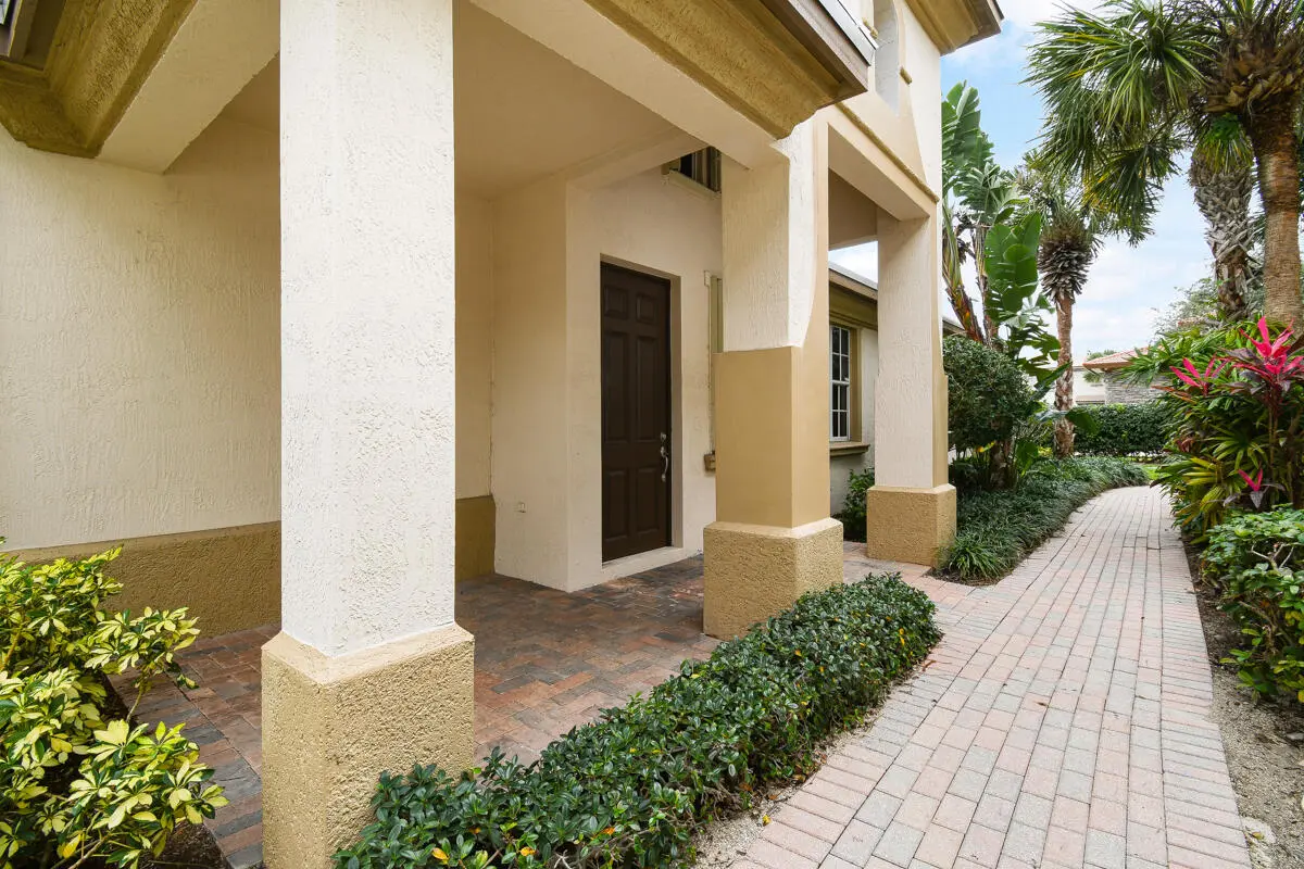 Pathway to Private Front Porch at 107 Evergrene Parkway, Palm Beach Gardens