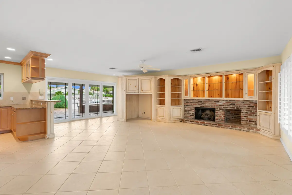Family Room with Fireplace at 2651 NE 43RD Street, Lighthouse Point