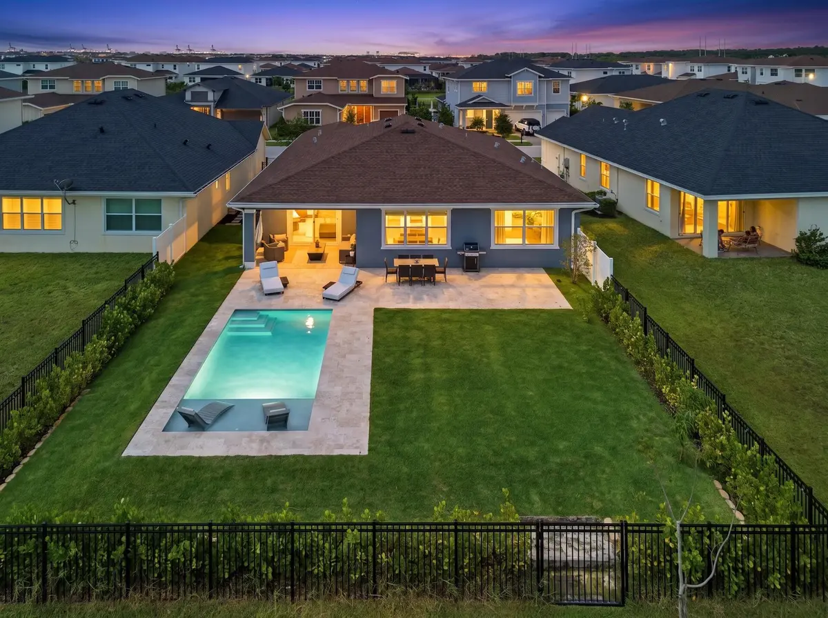 Rear Exterior Pool Twilight at 1534 HERON NOOK Road, The Acreage
