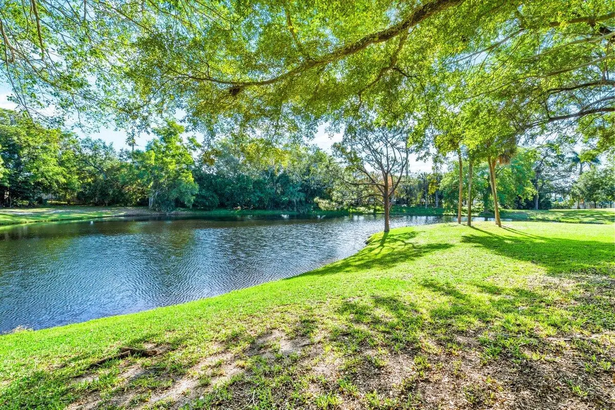 Backyard Serene Lake Views at 5087 Oakhill Lane, Delray Beach