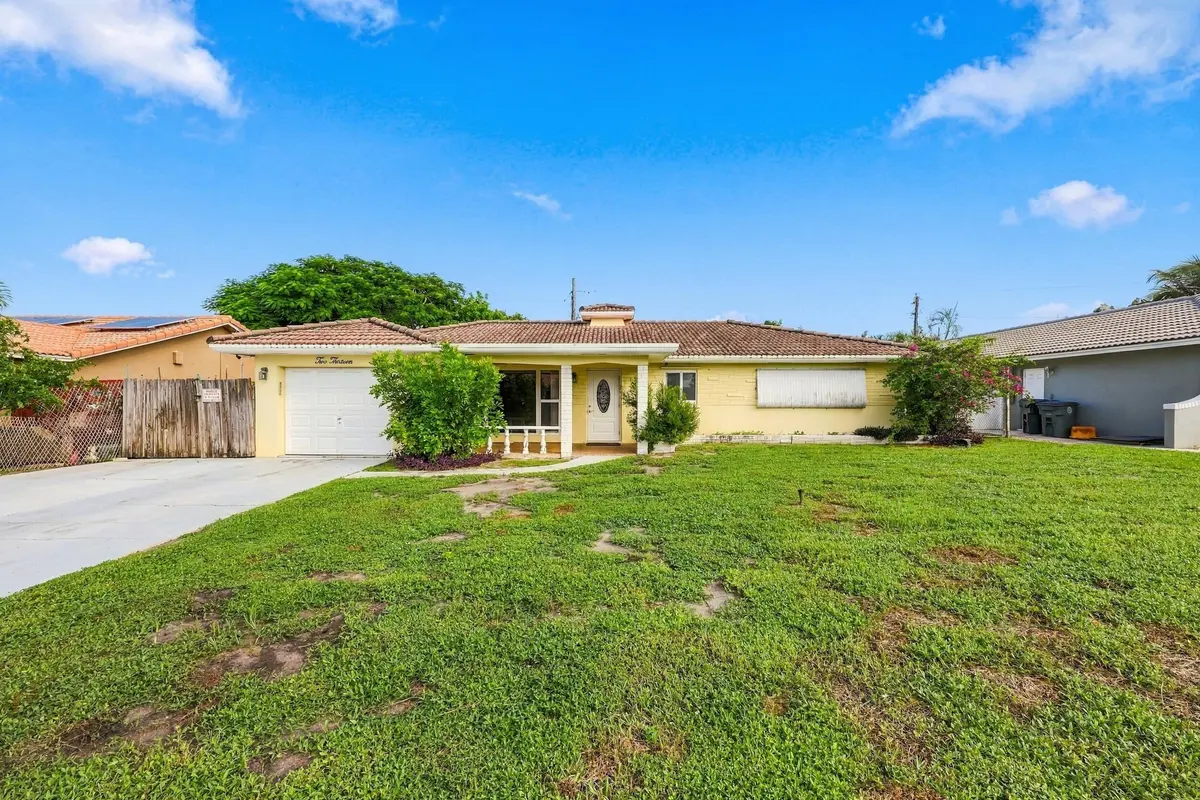 East Boca | No HOA | Under $600k at 213 NE 24th Court, Boca Raton