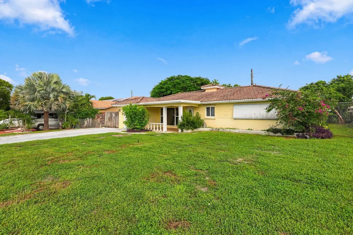 East Boca | No HOA | Under $600k at 213 NE 24th Court, Boca Raton