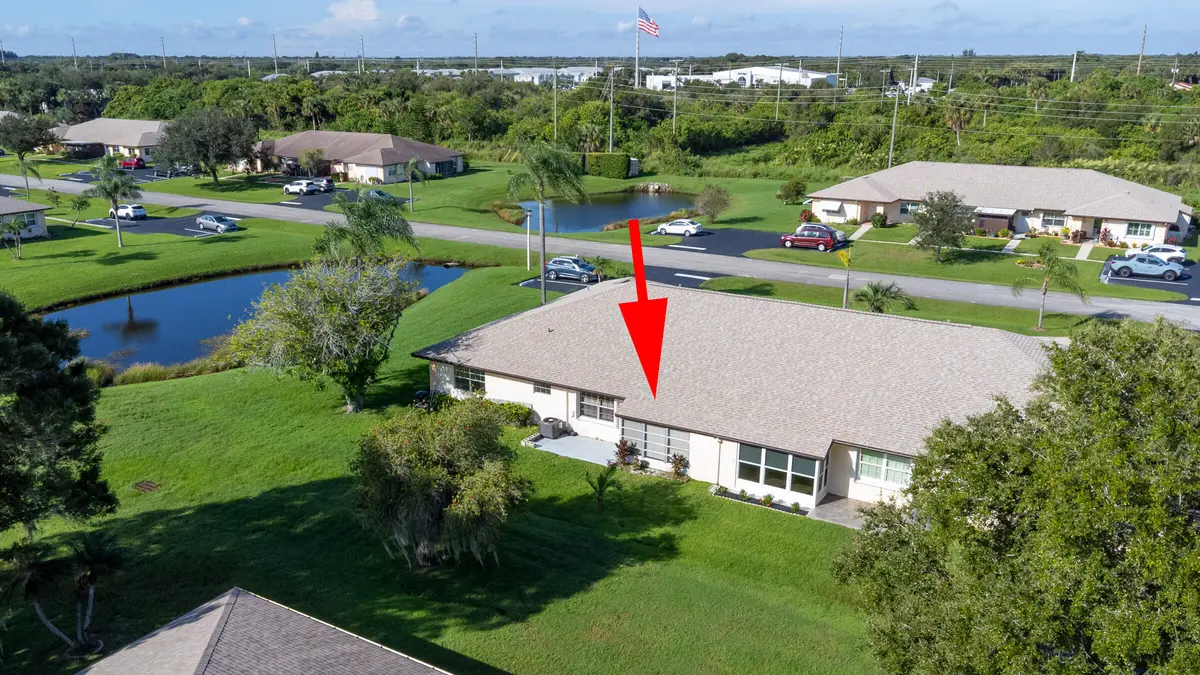 Red arrow 5794 Moss Ct Fort Pierce FL 34 at 5794 Moss Court 7E, Fort Pierce