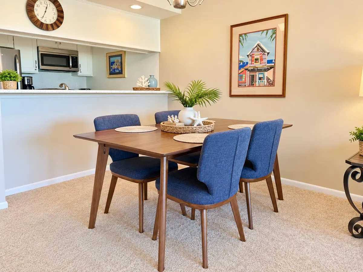 Coastal Dining Room with Kitchen Pass-Th at 5811 NE GULFSTREAM Way 4002, Hutchinson Island