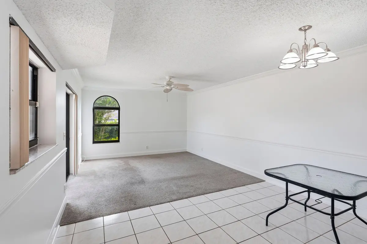 Living, dining at 3930 VILLAGE Drive C, Delray Beach