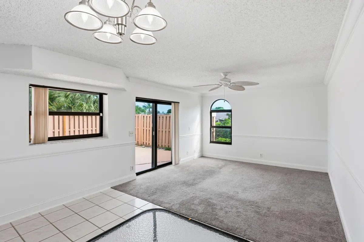 Living, dining at 3930 VILLAGE Drive C, Delray Beach
