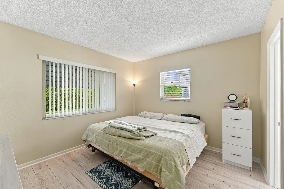 1117 Lake Ter 112 - Master Bed 1 at 1117 LAKE Terrace 112, Boynton Beach