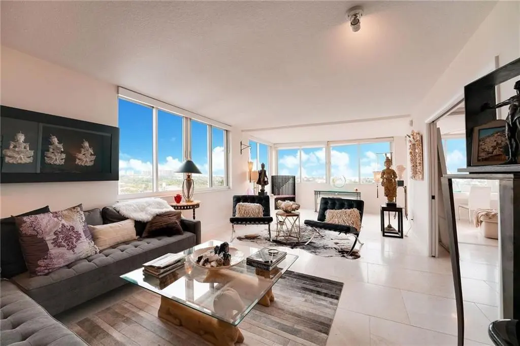 staged space pre-floor to ceiling window at 3100 NE 49TH Street 801, Fort Lauderdale