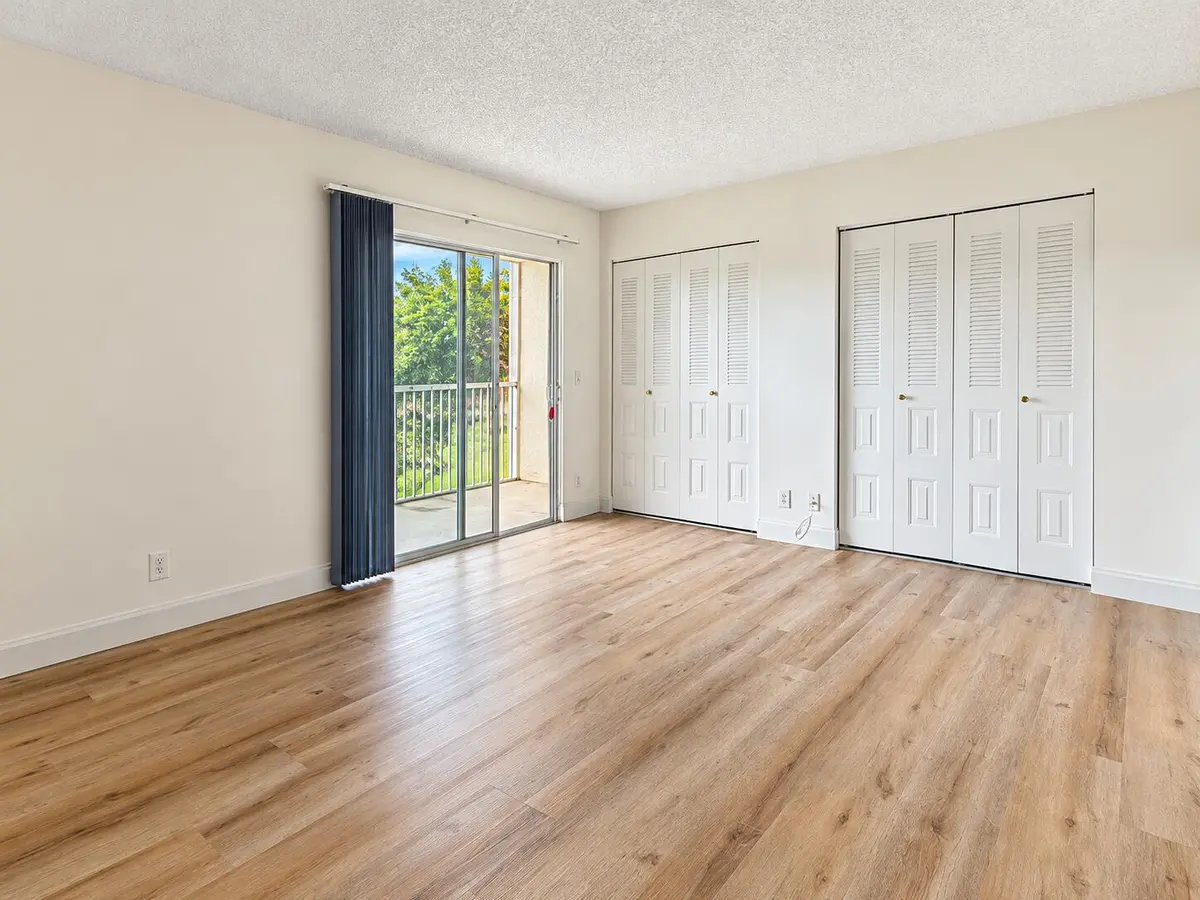 Bright Condo Room with Balcony Views at 101 SW 132nd Way 305J, Pembroke Pines
