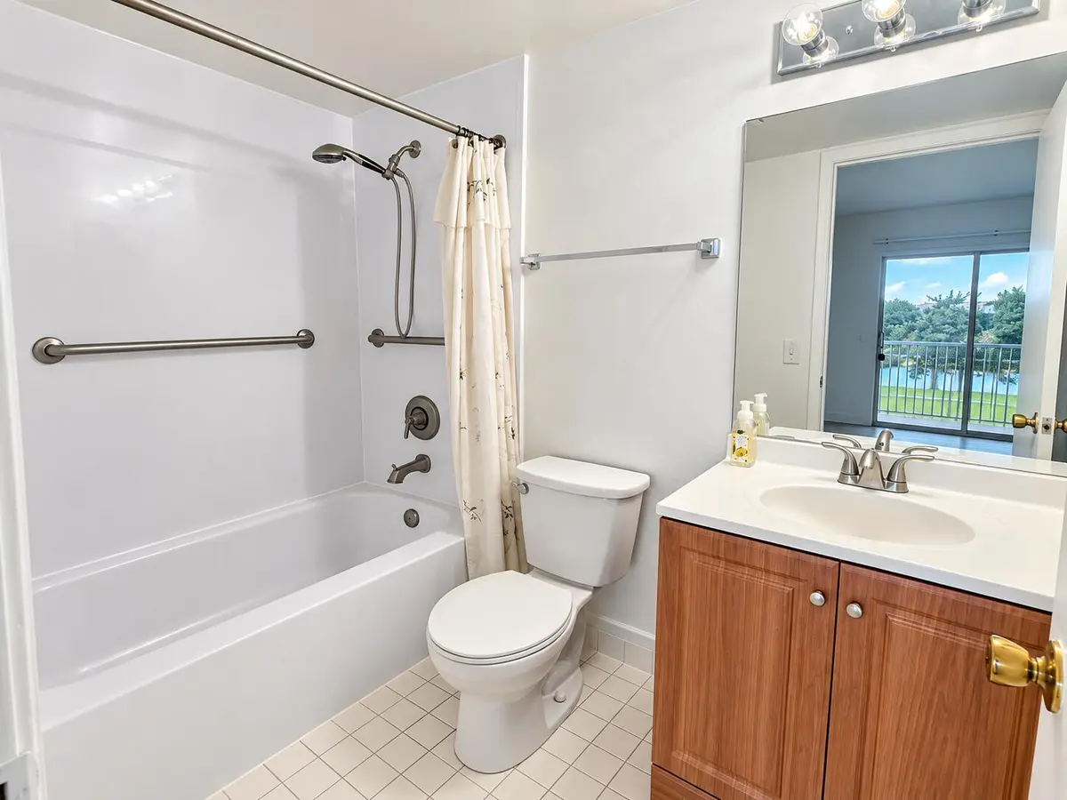 Bright Modern Bathroom with Balcony View at 101 SW 132nd Way 305J, Pembroke Pines