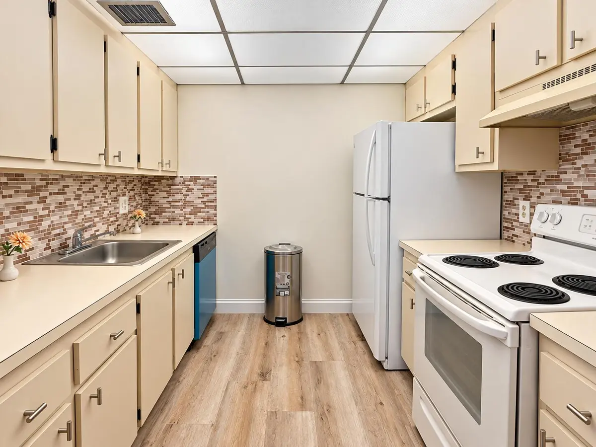Bright Modern Galley Kitchen at 101 SW 132nd Way 305J, Pembroke Pines