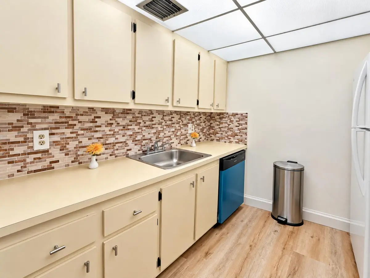 Bright Neutral Galley Kitchen at 101 SW 132nd Way 305J, Pembroke Pines