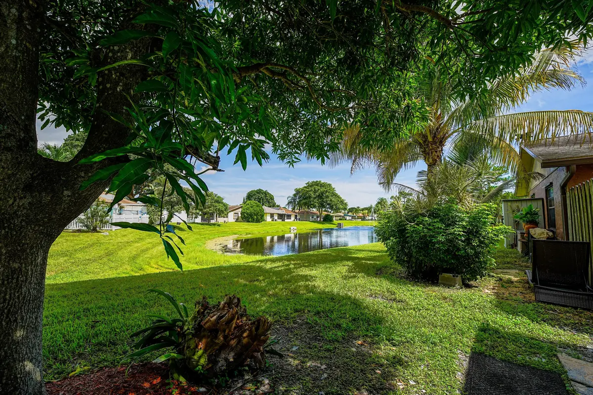 Back/Lake view at 4971 Palm Hill Drive, West Palm Beach