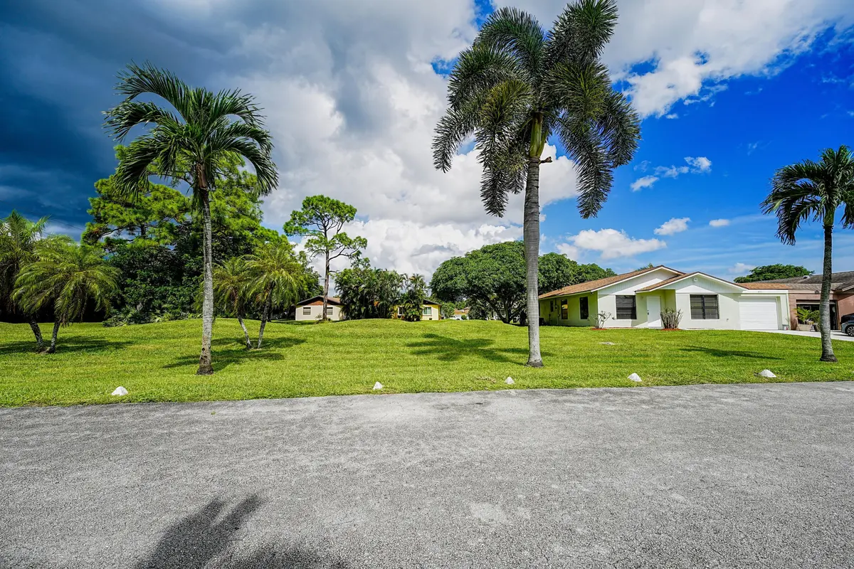View from dead-end street at 4971 Palm Hill Drive, West Palm Beach