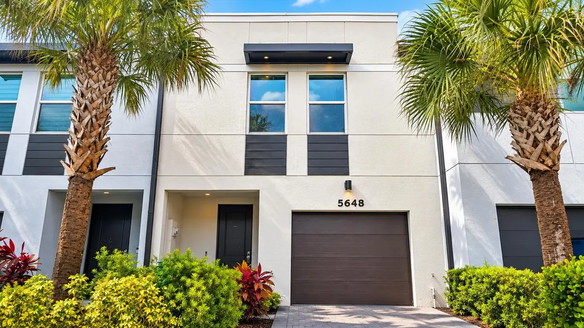 Modern Tropical Townhouse Facade at 5648 MENTMORE Drive, Mangonia Park