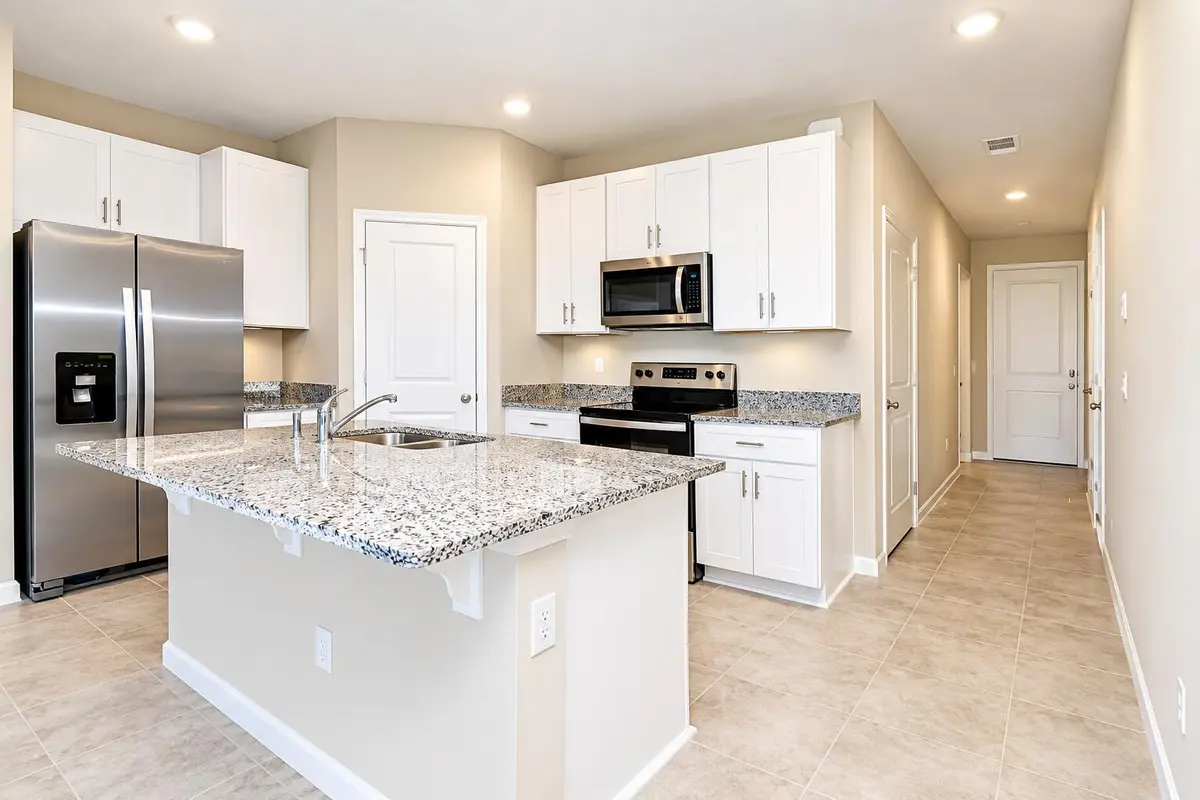 Modern Kitchen and Bright Hallway at 5648 MENTMORE Drive, Mangonia Park