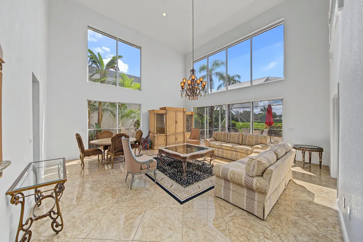 Walls of windows at 7756 Travelers Tree Drive, Boca Raton