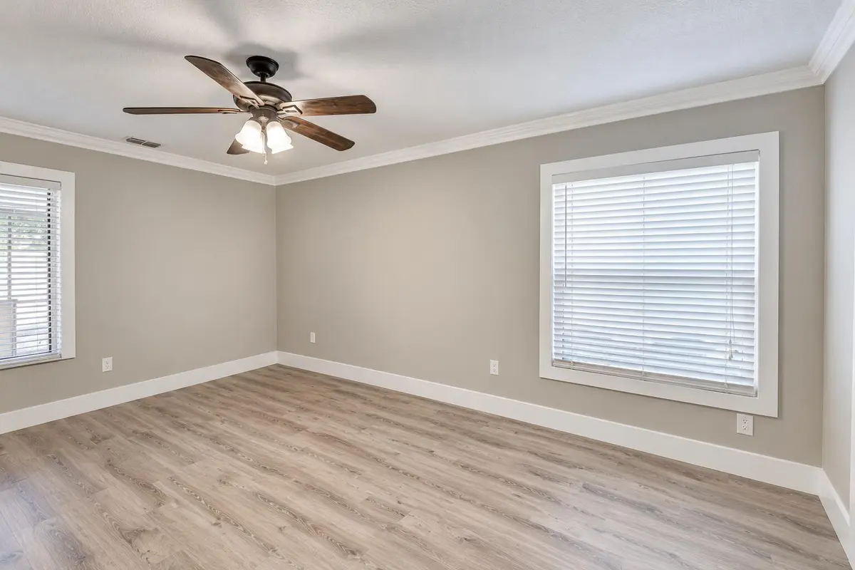 Empty Neutral-Toned Room with Ceiling Fa at 8379 Garden Gate Place, Boca Raton