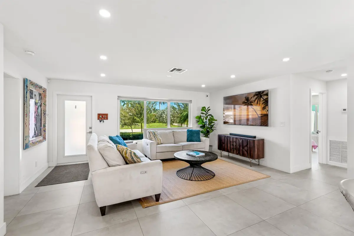 LIVING_ROOM_ANGLE_FRONT at 120 SE 12th Court, Pompano Beach