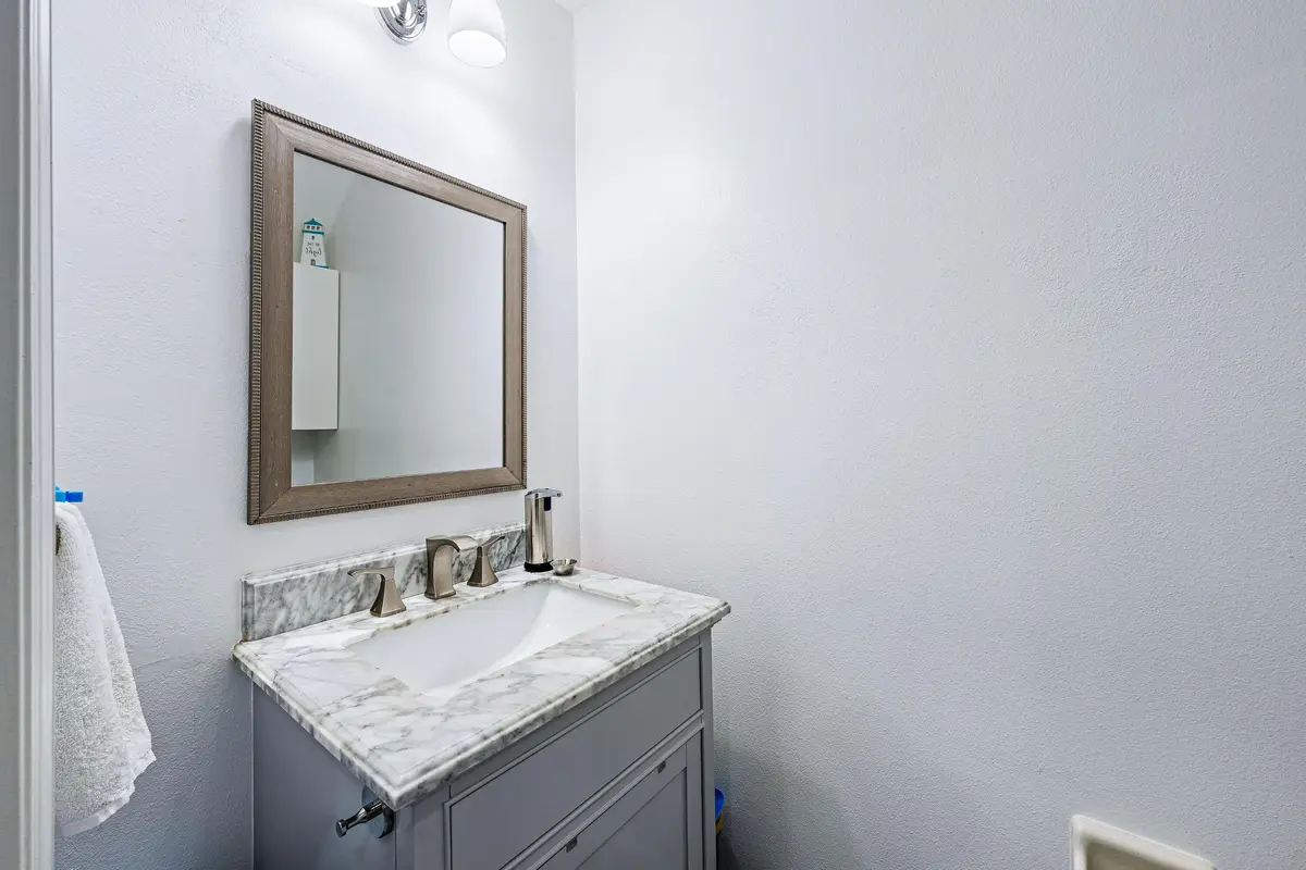 Downstairs Half Bath at 111 LIGHTHOUSE Circle D, Tequesta