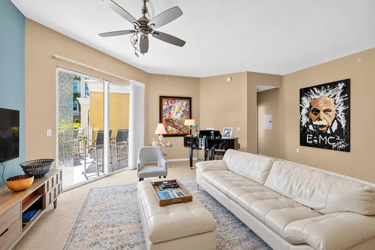 Sunlit Contemporary Living Room with Pia at 806 E Windward Way 108, Lantana