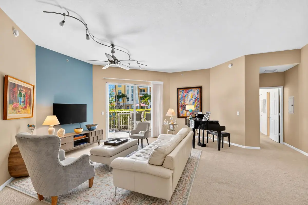 Airy Teal-Accented Condo Living Room at 806 E Windward Way 108, Lantana