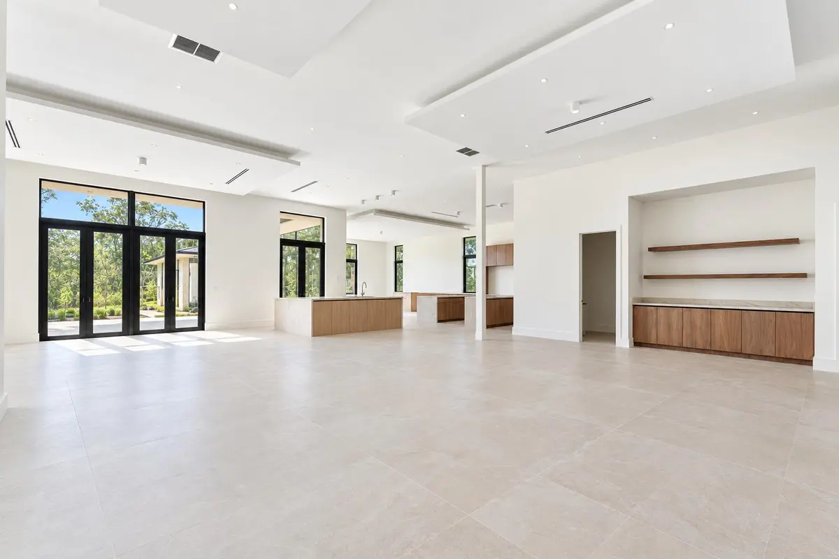 Bright clean kitchen with beige tile at 18200 SW 50 Court, Southwest Ranches