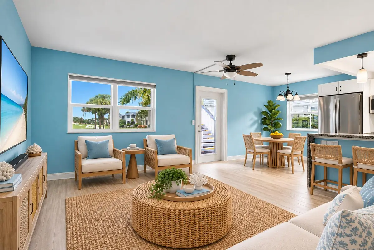 STAGED living room with golf views at 220 Tuscany D, Delray Beach