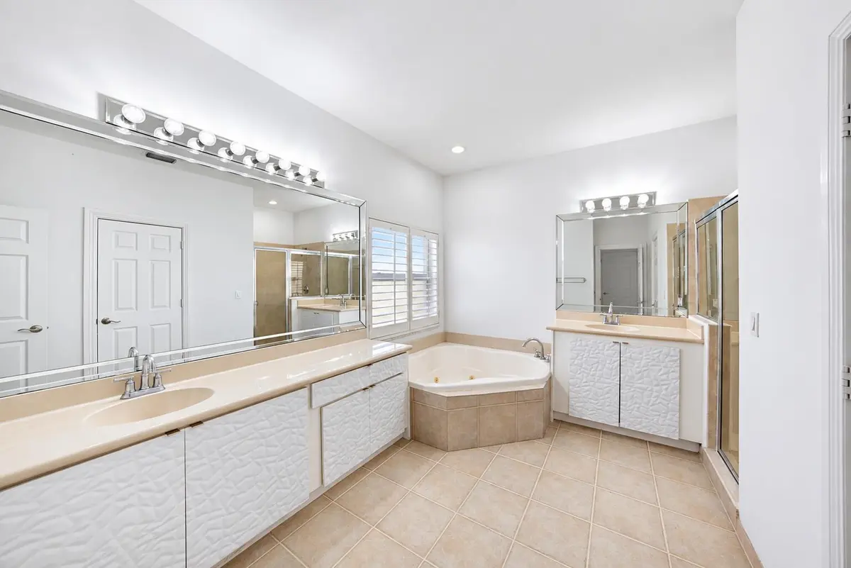 Bright Modern White Bathroom Retreat at 11289 NW 65TH Manor, Parkland