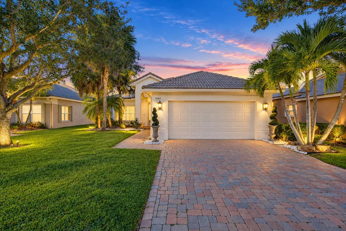 Twilight Mediterranean Home with Lush La at 11289 NW 65TH Manor, Parkland