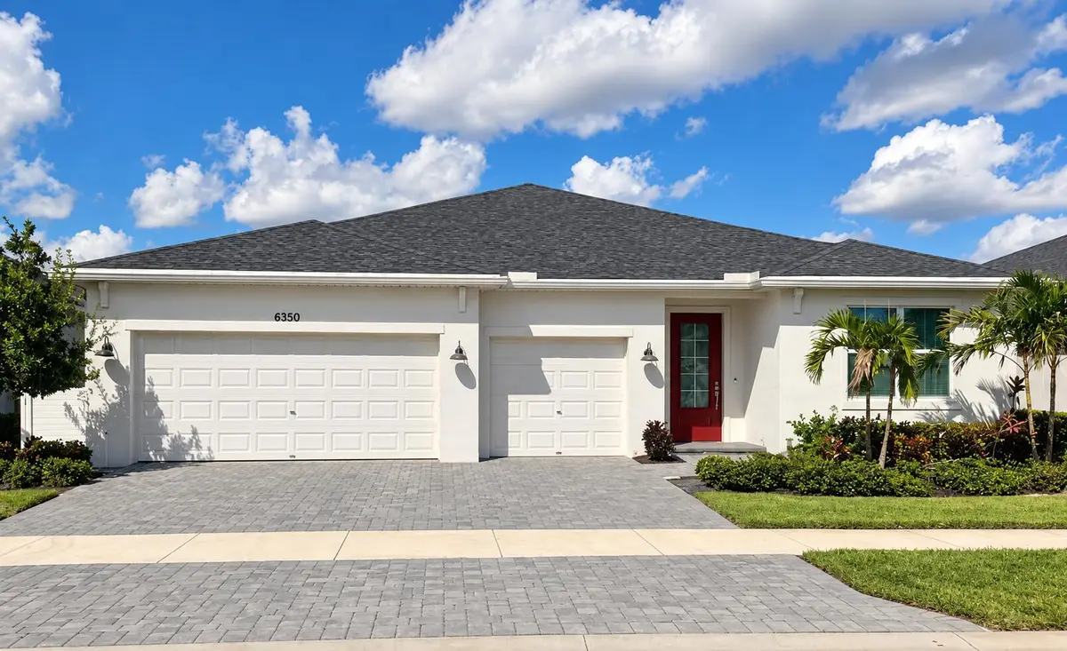 Vibrant 6350 Suburban Home Exterior at 6350 NW SWEETWOOD Drive, Port St. Lucie