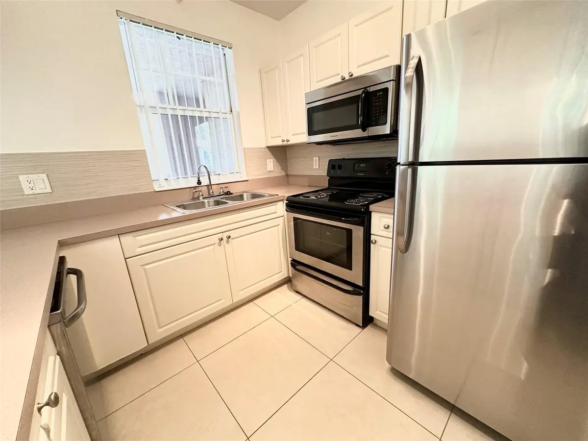 Photo 4 at 6778 W SAMPLE Road 6778, Coral Springs