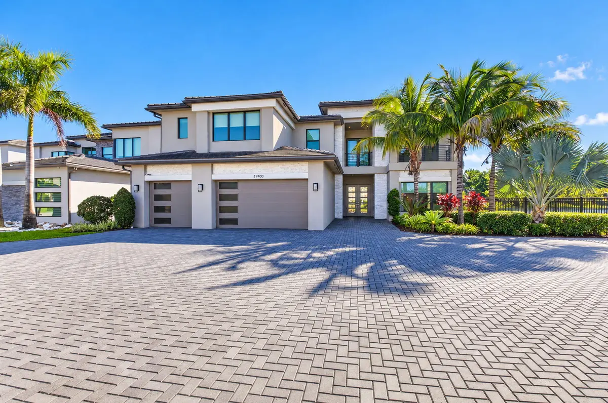 Exterior with large driveway at 17400 Ponte Chiasso Drive, Boca Raton
