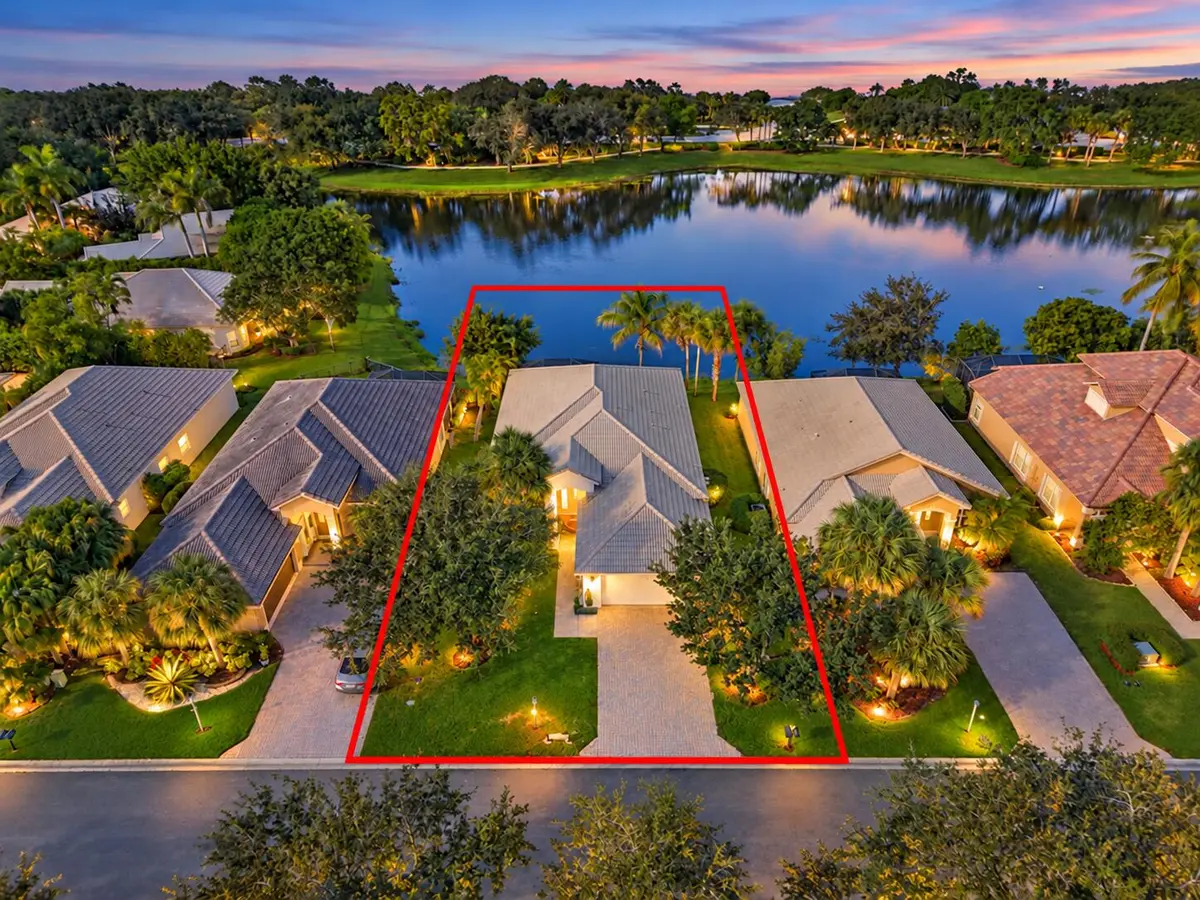 Twilight Lakeside Property Aerial at 11289 NW 65TH Manor, Parkland